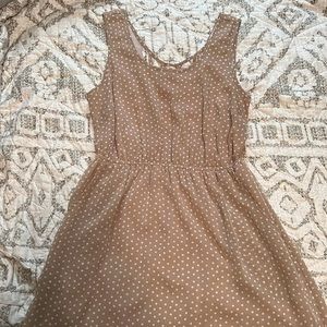 Cage back mini dress with polka dots and pockets